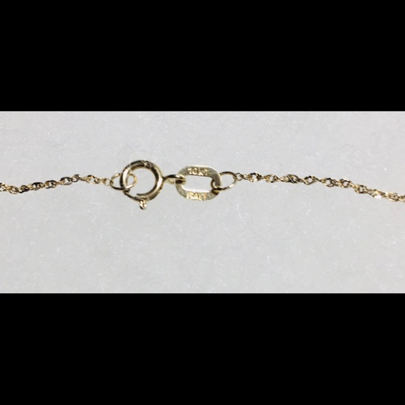 10K (Stamped) Gold Round Diamond Journey Pendant - Picture 5 of 12